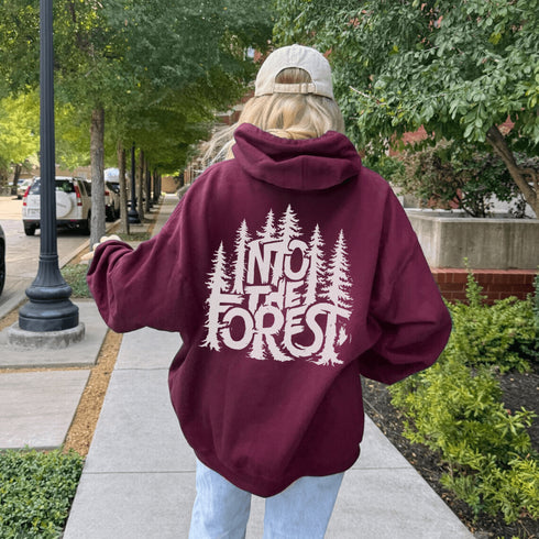 Step into the wild with the Into The Forest hoodie, where style meets nature in the most unforgettable way.